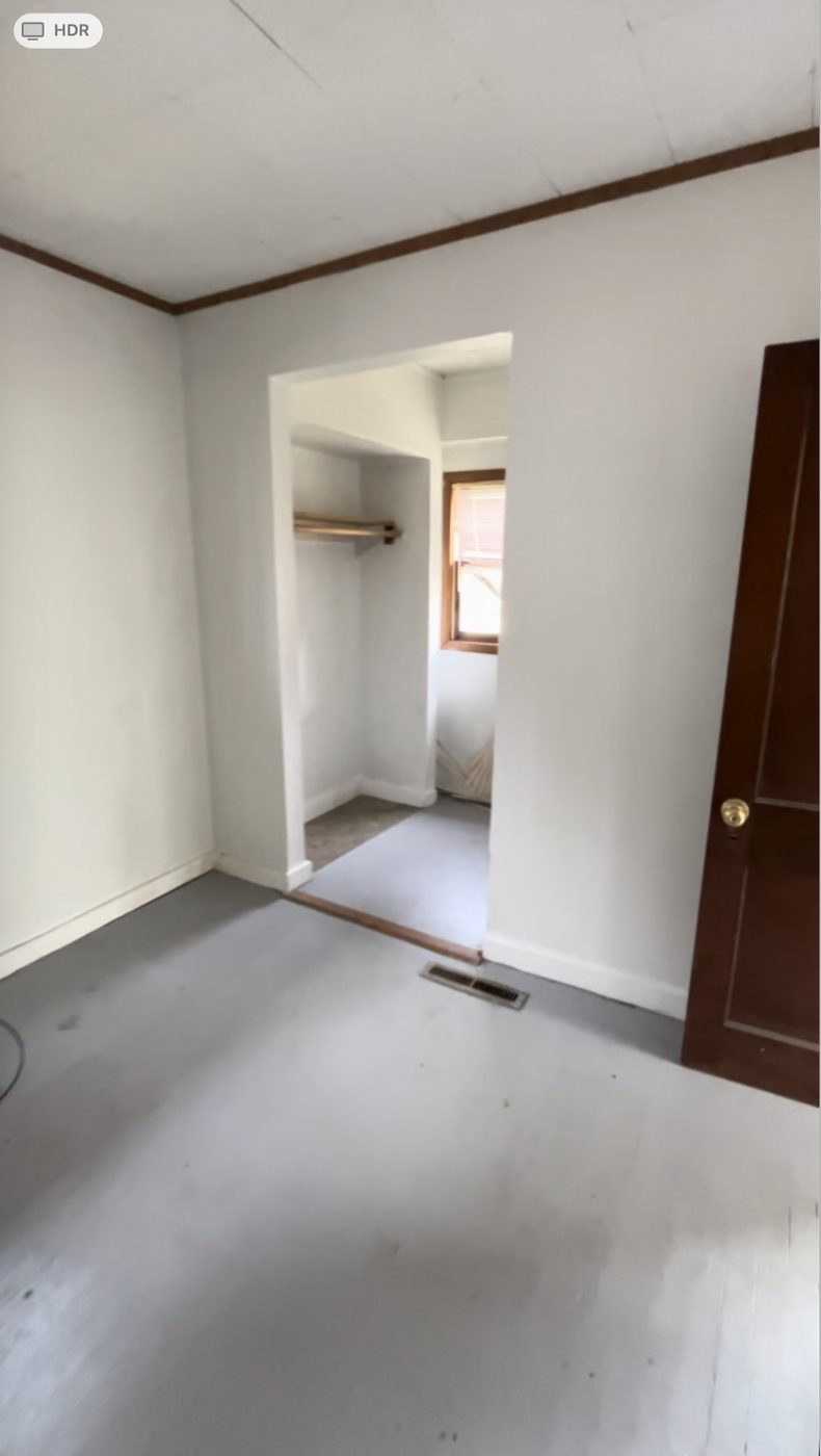Empty bedroom before renovation