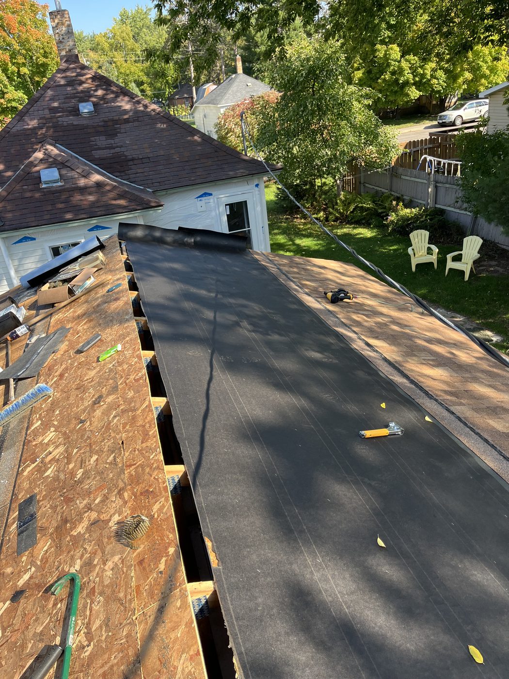 Roof torn down to the underlayment during reroofing