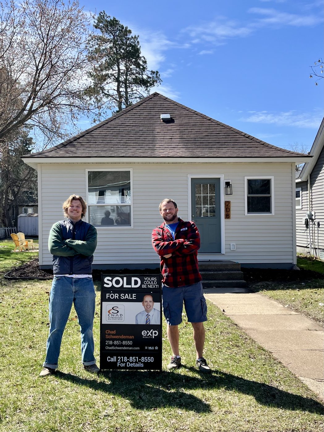 Sold sign in front of the finished house