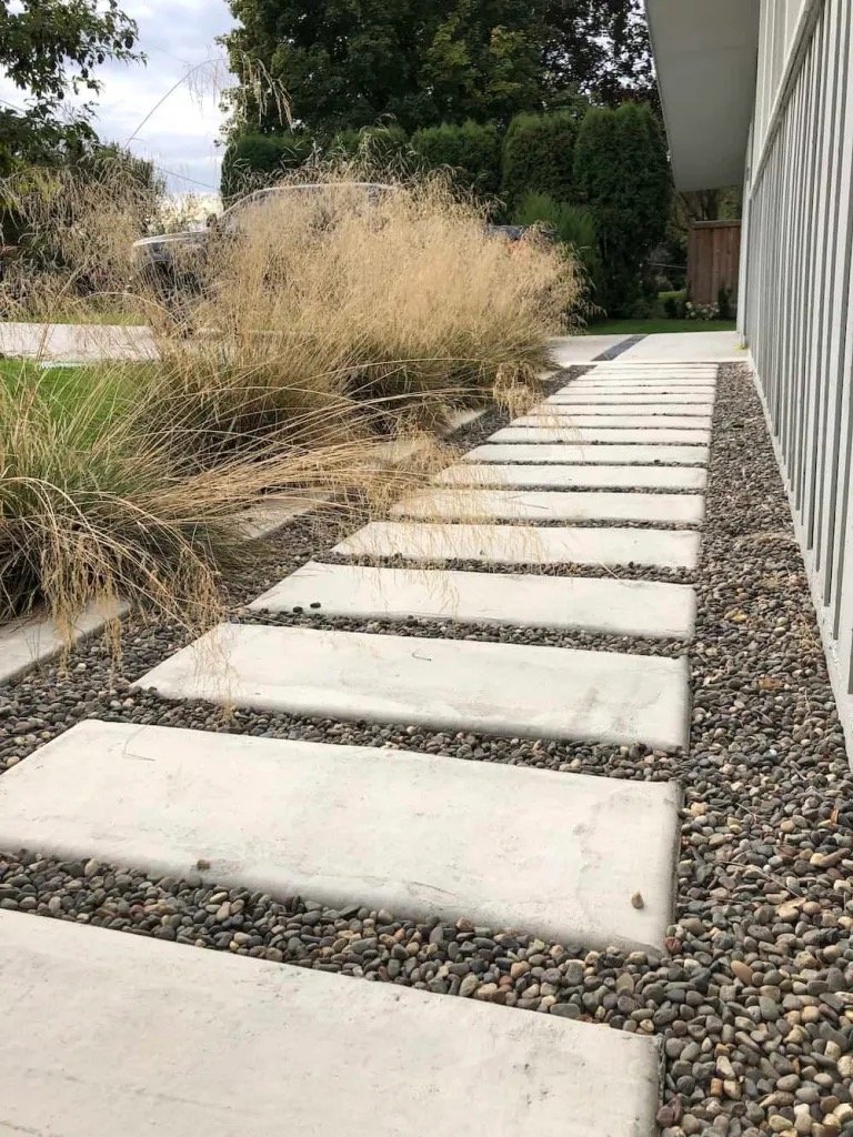 Reference photo of a modern rock-and-large-paver walkway style, not a photo from this project